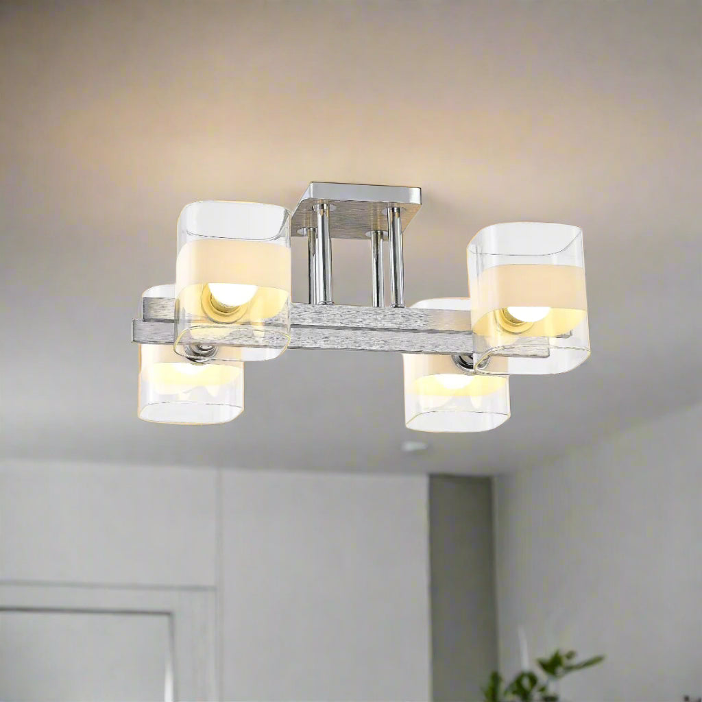 Contemporary rectangular ceiling-mounted light fixture with four double-layered square glass shades