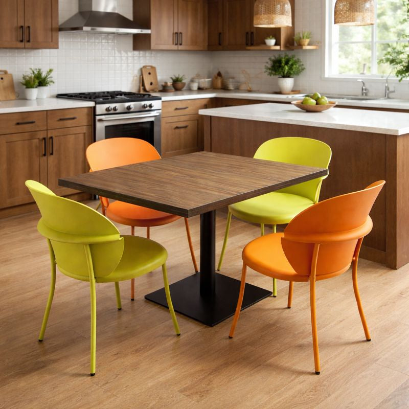 Colorful chairs around a wooden table in a kitchen