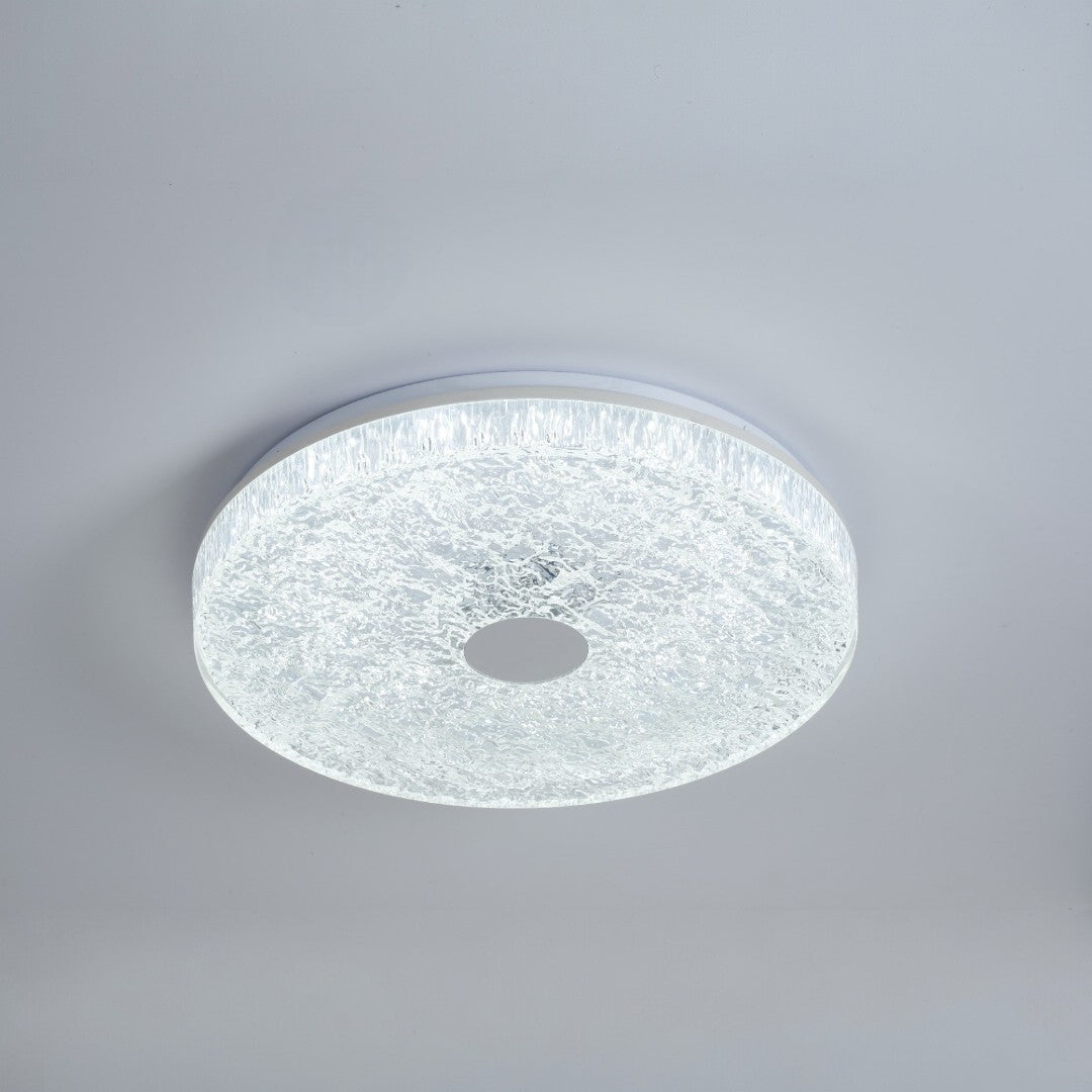 Ceiling light fixture with textured surface on a gray background