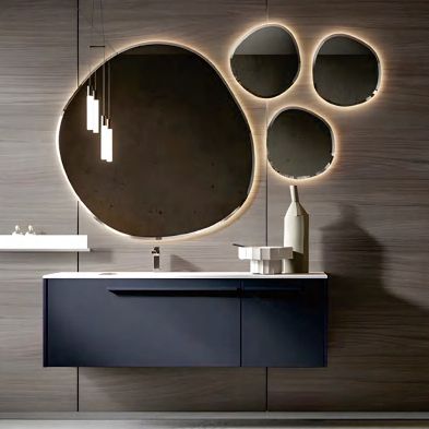 Bathroom with modern vanity and circular mirrors with lights
