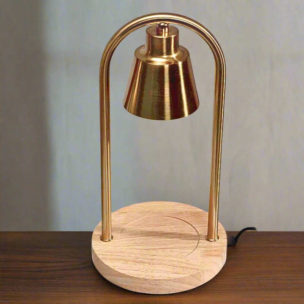 A sleek table lamp featuring a metallic arched handle and a cylindrical light.