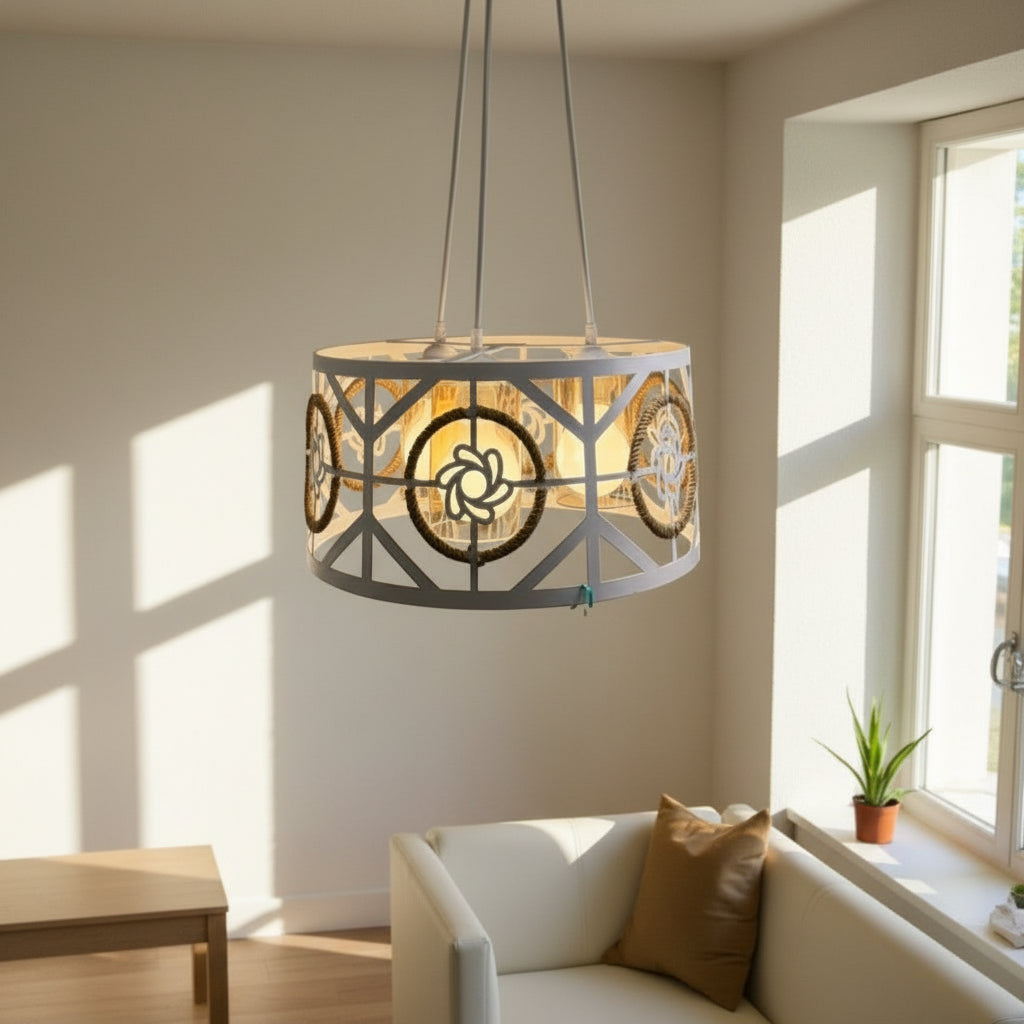 Decorative pendant light hanging in a room with a couch and plants.