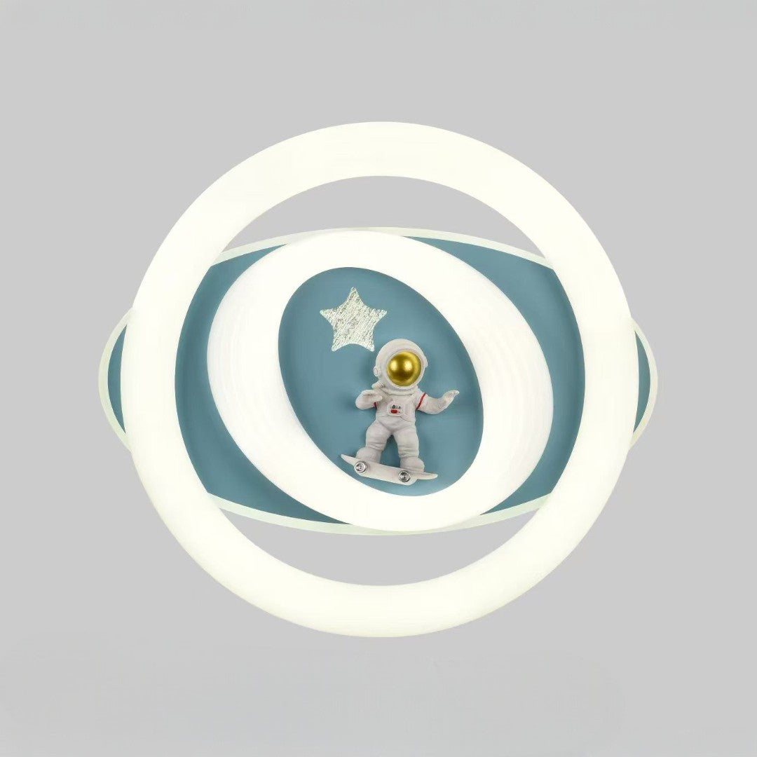 Ceiling light fixture with astronaut and star design on a gray background