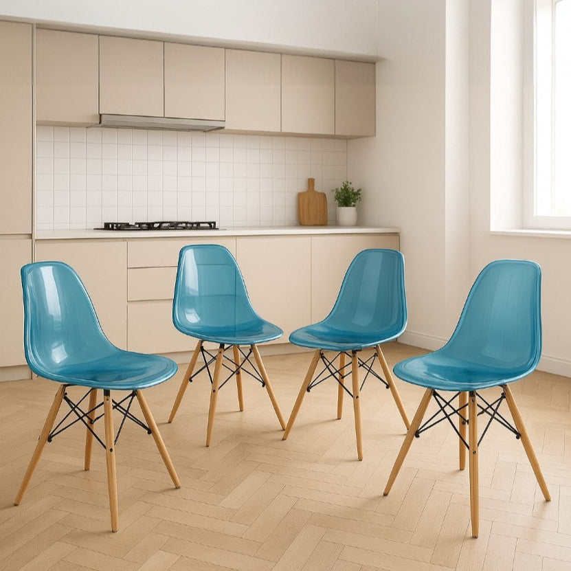 Four blue chairs with wooden legs arranged in a kitchen.