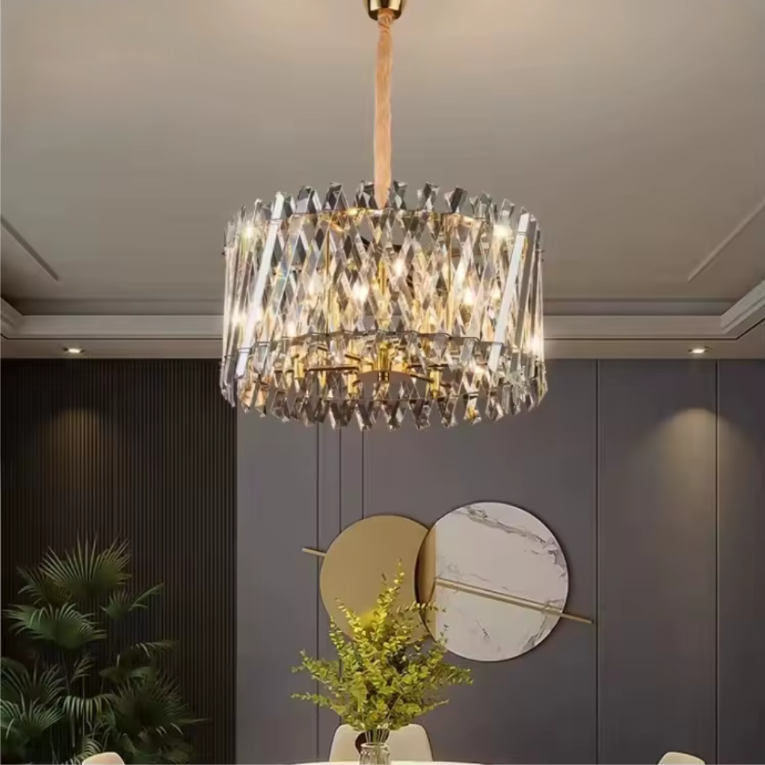 Crystal chandelier hanging in a room with a modern decor.