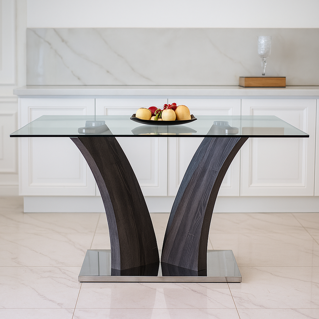 Modern glass dining table with dark wood legs in a kitchen setting