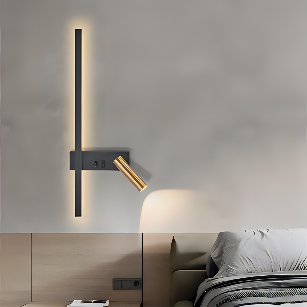 A modern bedroom wall light featuring a sleek black base, an integrated vertical LED strip for ambient lighting, and an adjustable gold spotlight for focused illumination.