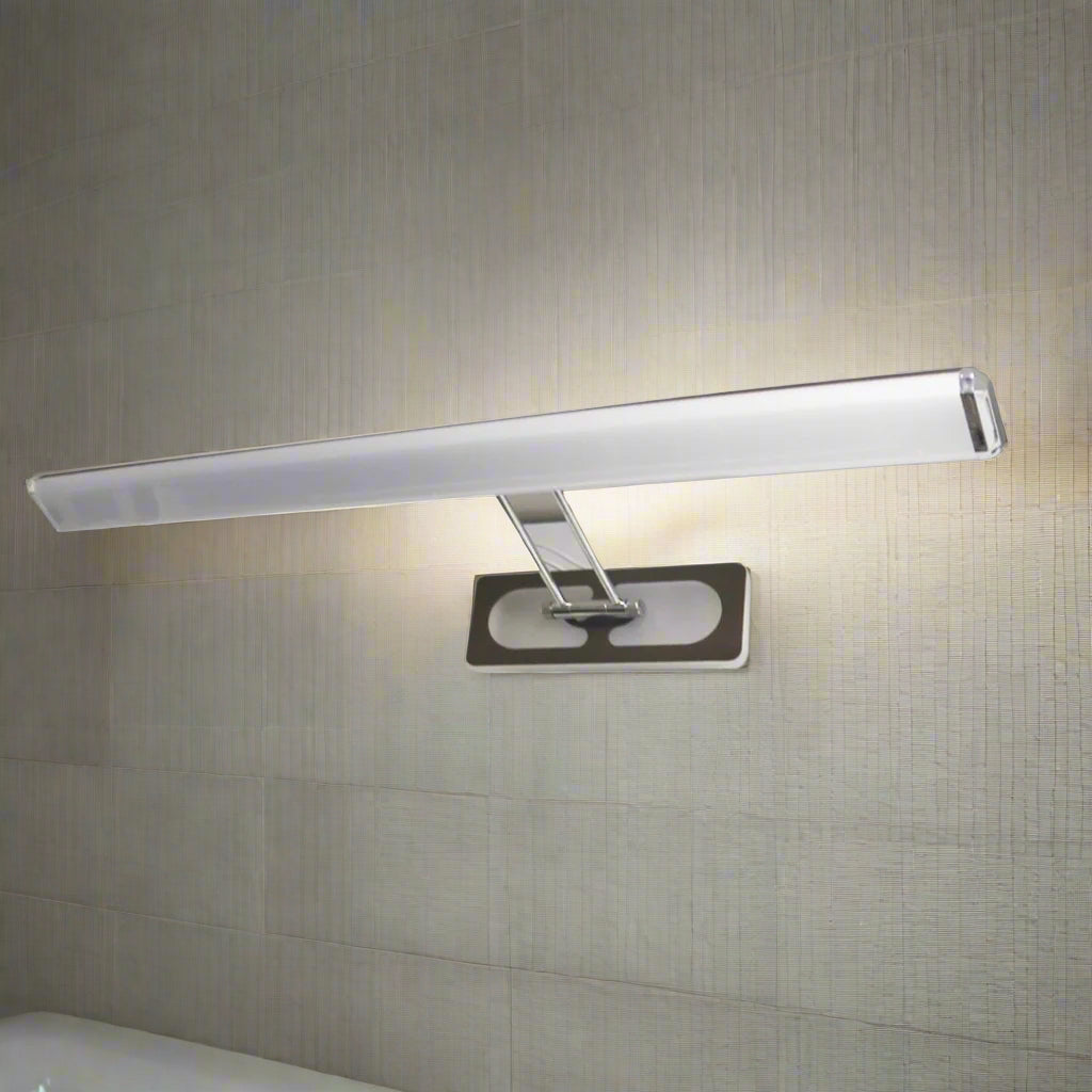 A sleek silver and brown LED vanity light with a minimalist design, mounted on a metallic base.