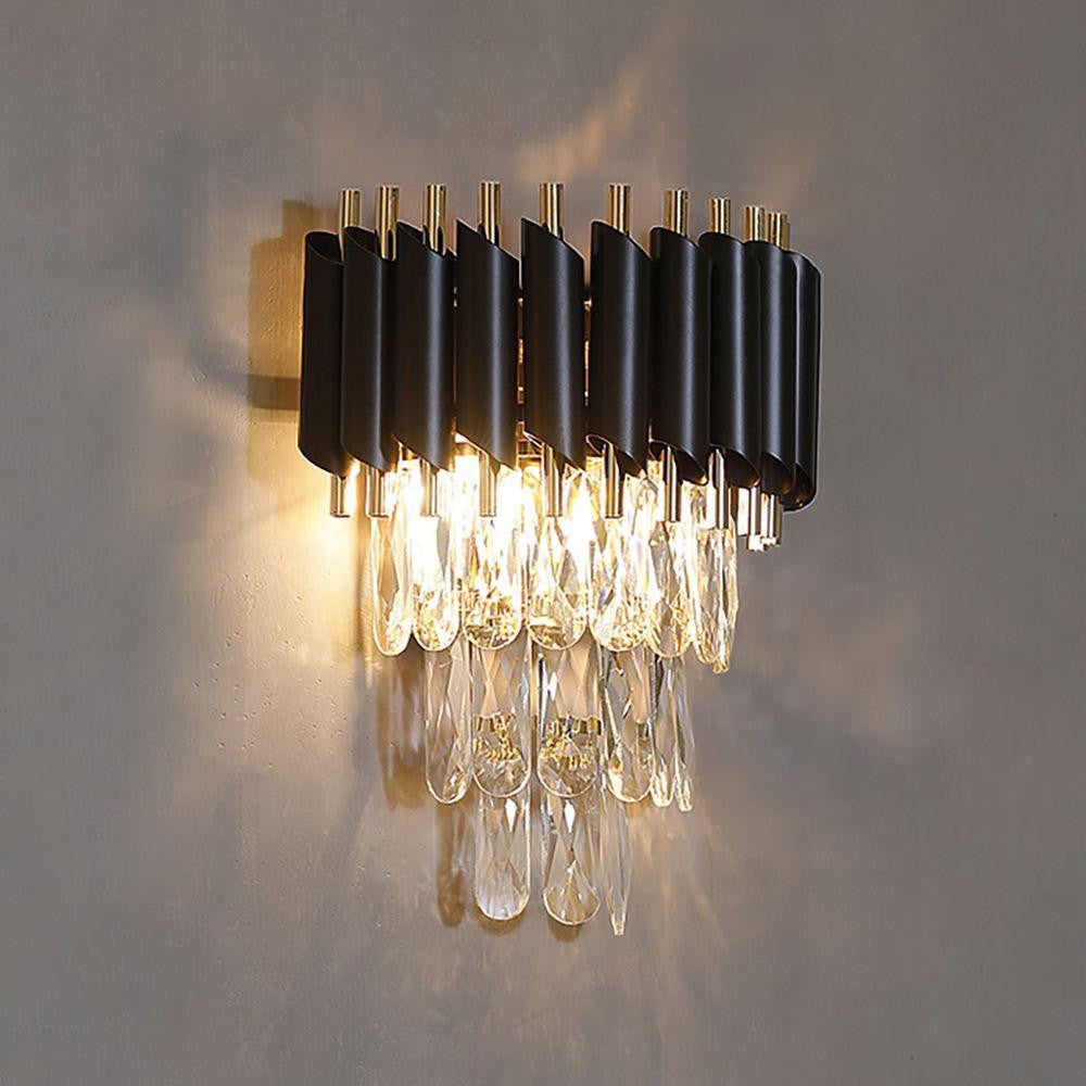 A luxurious lighting fixture composed of sleek black and gold metal rods, adorned with shimmering crystal droplets that hang gracefully.