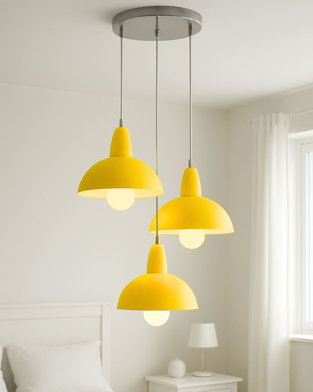 Three yellow pendant lights hanging in a room with a neutral color scheme.