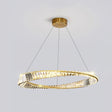 A modern gold and crystal circular chandelier