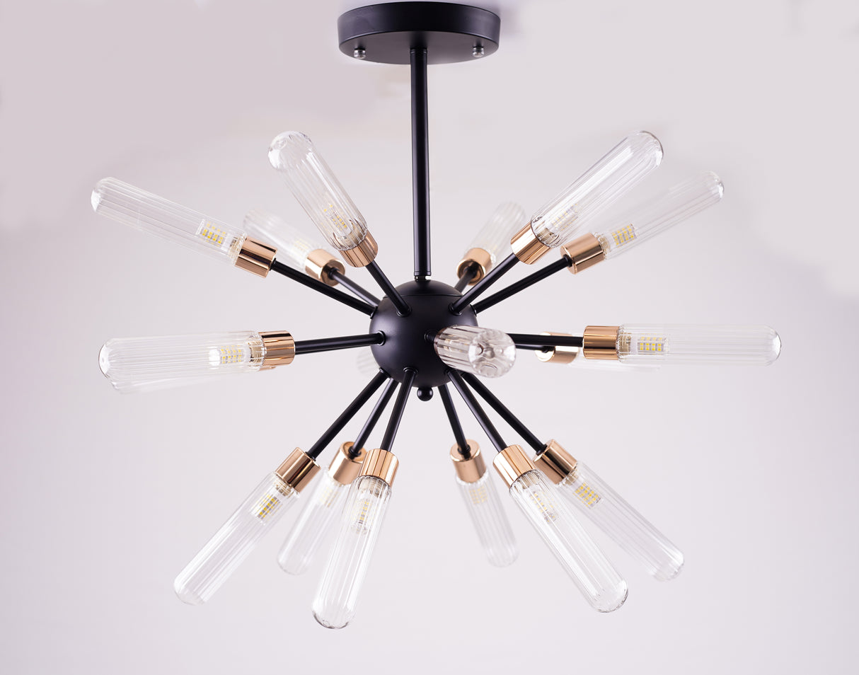 A black chandelier with long, exposed tube bulbs arranged in a starburst pattern