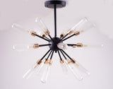 A black chandelier with long, exposed tube bulbs arranged in a starburst pattern