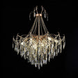 Classic gold and crystal chandelier with layered hanging prisms and chain detailing, ideal for luxurious interiors.