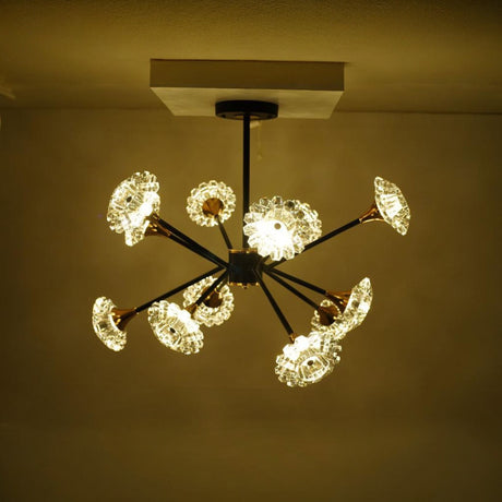 Round black and gold modern chandelier, showcasing a central matte black fixture base.
