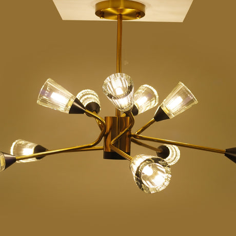  modern chandelier with gold finish and multiple angled arms holding clear fluted glass shades.
