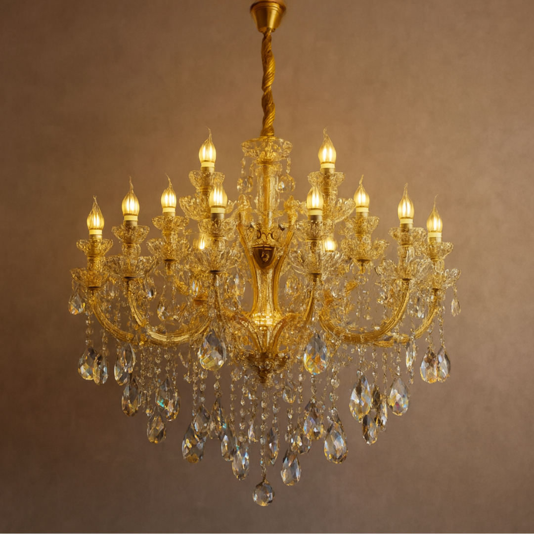 Gold chandelier with crystal accents on a brown background