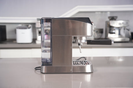 Stainless steel espresso machine on a kitchen counter