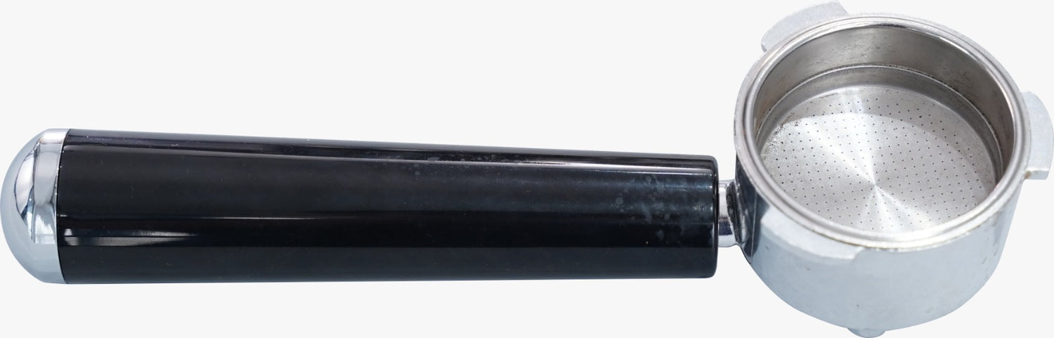 Coffee filter holder with black handle and metal filter on a white background