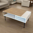 Modern rectangular center table with a natural oak-finish top and white open-shelf body, supported by black metal hairpin legs, placed in a living room setting with neutral decor
