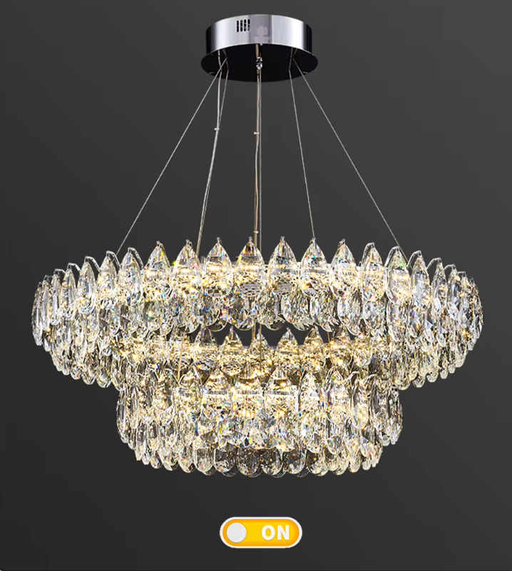 Crystal chandelier with 'ON' indicator on a dark background