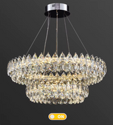 Crystal chandelier with 'ON' indicator on a dark background