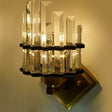 This close-up shot highlights the layered design of the transparent crystal rods, which refract the LED light, producing a warm and dazzling illumination.
