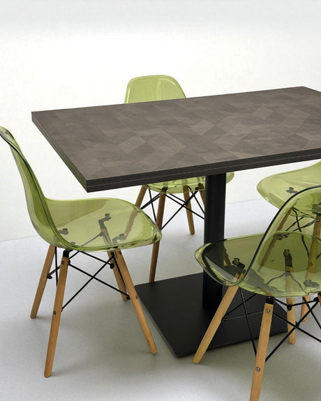 Dining table with four green chairs on a white background