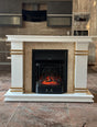 A modern white and wood fireplace mantel with a black electric fireplace insert, showcasing a contemporary aesthetic with a warm glow.