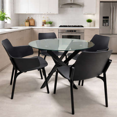 Modern kitchen with a glass dining table and black chairs