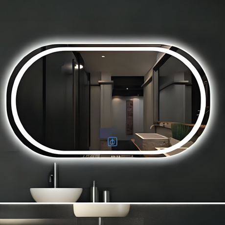 Bathroom with a large oval mirror with LED lighting, sink, and dark walls.