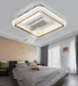 Ceiling-mounted air conditioning unit with LED light fixture in a bedroom setting.