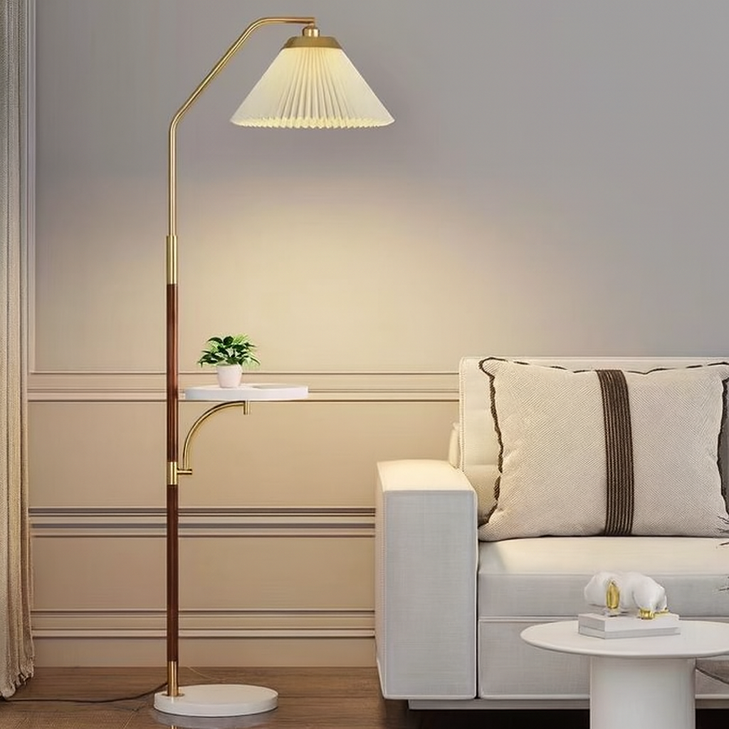 Modern living room with a floor lamp, sofa, and decorative items.