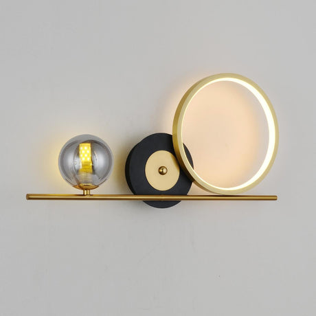 wall light  gold horizontal bar with circular elements, including a frosted LED ring and a smoked glass globe, creating a sophisticated and contemporary look.