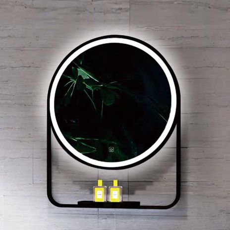 Round illuminated mirror with a shelf on a wooden wall