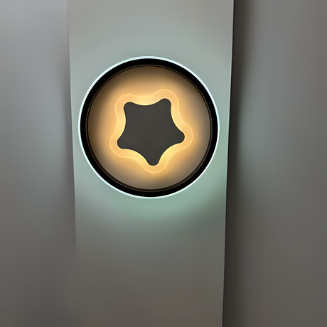 Modern LED Wall & Ceiling Light. Fixed on a white wall, its sleek, wavy design emits a warm, ambient glow, blending style and function effortlessly.