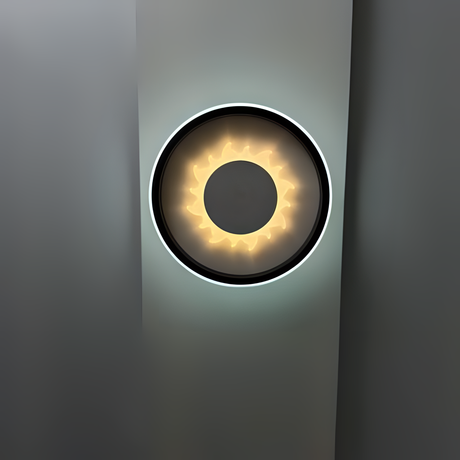 Modern circular LED wall light with heart-shaped design, fixed on a white wall.