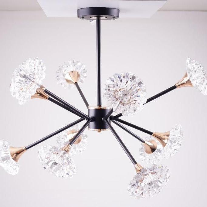 Contemporary black chandelier with flower glass diffusers , radiating from a central hub.