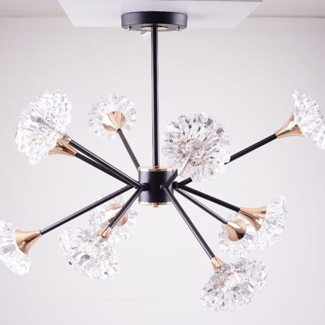 Contemporary black chandelier with flower glass diffusers , radiating from a central hub.