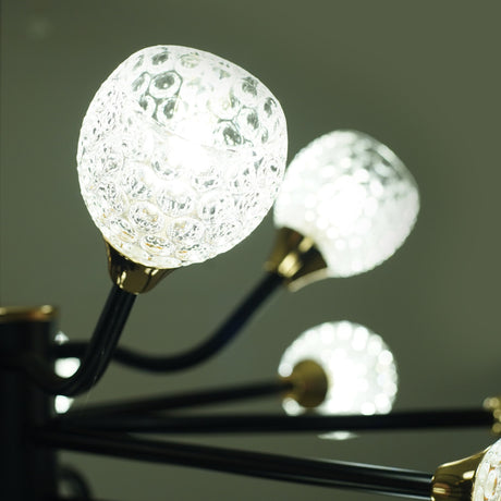 A close-up of the textured glass globes on the black chandelier.