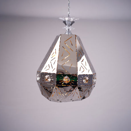A geometric, faceted metal pendant light with reflective surfaces and decorative patterns, displayed against a soft background.
