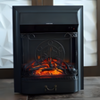 A black freestanding electric fireplace with an intricate metal design on the front and glowing embers inside.