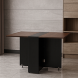 Two-toned office desk with wooden top and black base in a room setting.