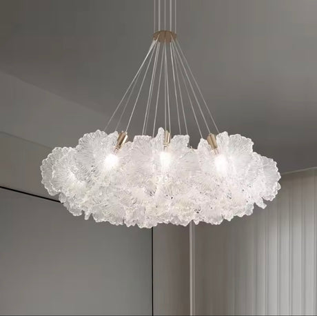 Modern chandelier with crystal-like design hanging from the ceiling.