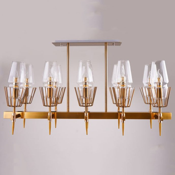 A sleek gold chandelier with a geometric design and multiple glass-shaded lights, mounted on a light-colored ceiling.