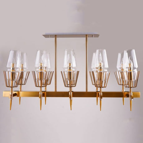 A sleek gold chandelier with a geometric design and multiple glass-shaded lights, mounted on a light-colored ceiling.