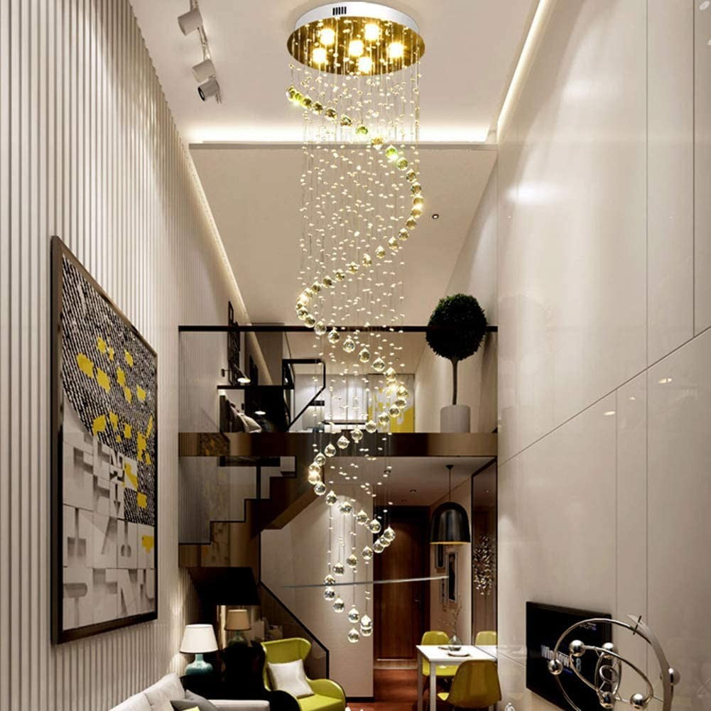 Helical chandelier with cascading crystal balls and soft LED lights in a modern two-story apartment.